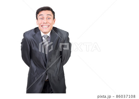 Delighted man in formal suit in studio Delighted man in formal suit in studio 86037108