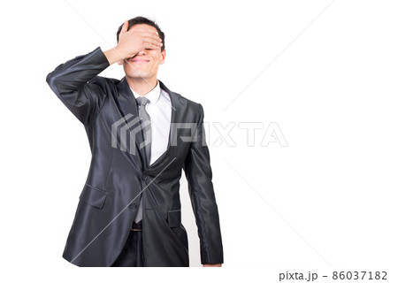 Adult surprised man in costume covered eyes with hand Adult surprised man in costume covered eyes with hand 86037182