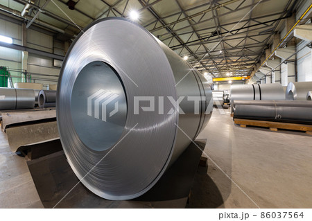 Closeup photo of metal tile for roof in metallic forming machine production line in factory. Cold 86037564