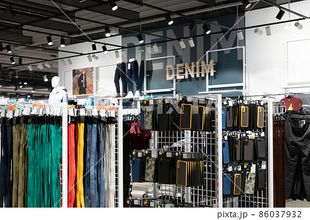 a showcase with straps and cases for mobile phones in a youth fashion store a showcase with straps and cases for mobile phones in a youth fashion store 86037932