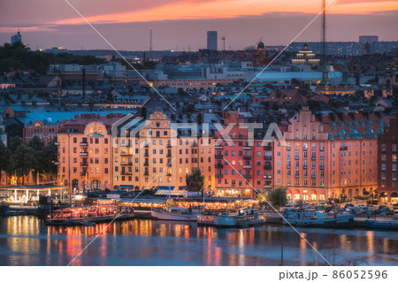 Stockholm, Sweden. Skyline View Of Residential Area Houses In Norr Malarstrand Street, Kungsholmen Island. Scenic View In Sunset Twilight Dusk Lights. Evening Lighting Stockholm, Sweden. Skyline View 86052596