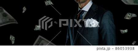 Us dollar. Rich businessman holding hundred dollars of America. Money usd bill falling background. 86053938