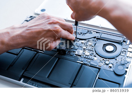 Computer motherboard. Pc technician repair service with laptop on hardware technology background. Maintenance engineer support. Developer soldering electronic component. 86053939