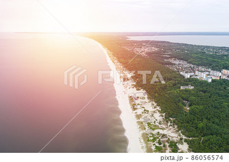 Baltic coastline with green summer forest and the sea. Baltiysk beach. Aerial view 86056574