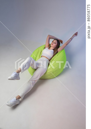 Young caucasian woman with cute face poses for the 86058775