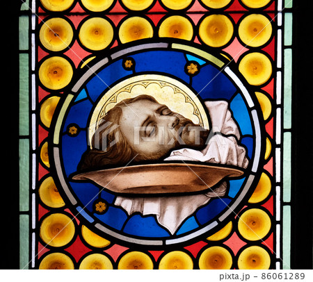 The head of Saint John the Baptist, stained glass window in Basilica of Saint Sylvester the First (San Silvestro in Capite) in Rome, Italy The head of Saint John the Baptist, stained glass window in Basilica of Saint Sylvester the First (San Silvestro in Capite) in Rome, Italy 86061289