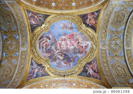 The fresco of virtue Charity on the little cupola of side nave in Basilica dei Santi Ambrogio e Carlo al Corso by Pio Paolini, Rome, Italy 86061398
