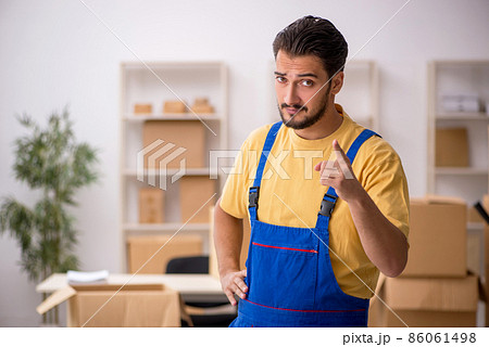Young male contractor doing home relocation Young male contractor doing home relocation 86061498