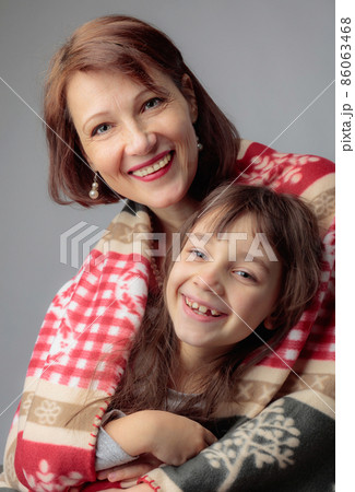 Happy grandma and granddaughter. Happy grandma and granddaughter. 86063468