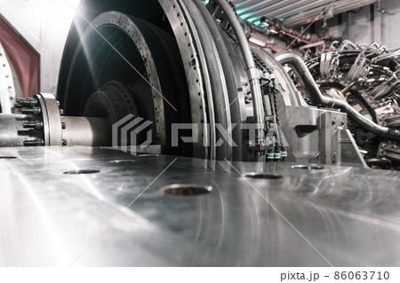The rotor of a gas turbine compressor with a bolted coupling half The rotor of a gas turbine compressor with a bolted coupling half 86063710