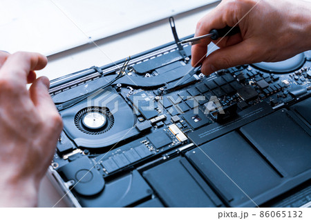 Computer motherboard. Pc technician repair service with laptop on hardware technology background. Maintenance engineer support. Developer soldering electronic component. 86065132
