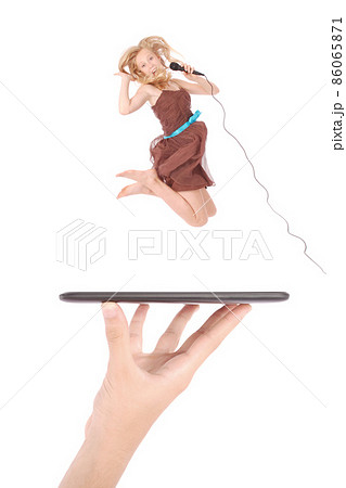 Young girl jump using tablet pc on people hand Young girl jump using tablet pc on people hand 86065871