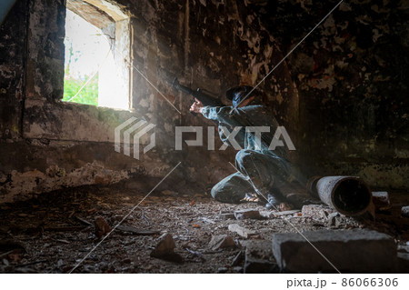soldier training while playing paintball in the fortress soldier training while playing paintball in the fortress 86066306
