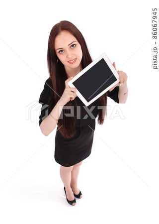 Happy student teenage girl view from above and showing a tablet display application Happy student teenage girl view from above and showing a tablet display application 86067945