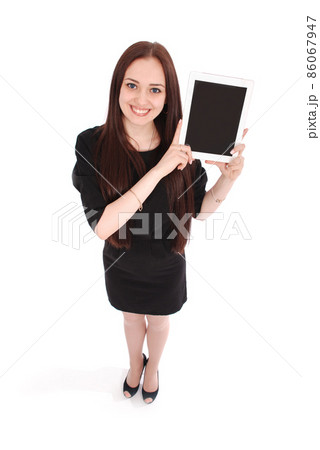 Happy student teenage girl view from above and showing a tablet display application Happy student teenage girl view from above and showing a tablet display application 86067947