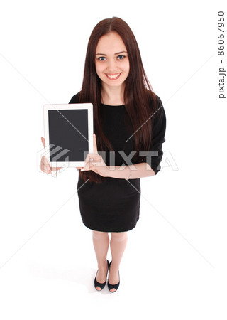 Happy student teenage girl view from above and showing a tablet display application Happy student teenage girl view from above and showing a tablet display application 86067950