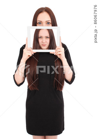 Teenage girl emotions. Girl showing a blank tablet screen Teenage girl emotions. Girl showing a blank tablet screen 86067976