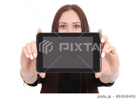 Smiling student teenage girl showing a tablet display application Smiling student teenage girl showing a tablet display application 86068400