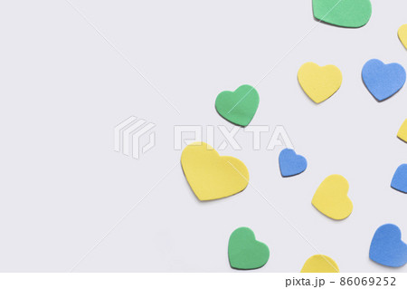 Valentine's Day background. Multicolor hearts on white background. Valentines day concept. Flat lay, top view, copy space 86069252