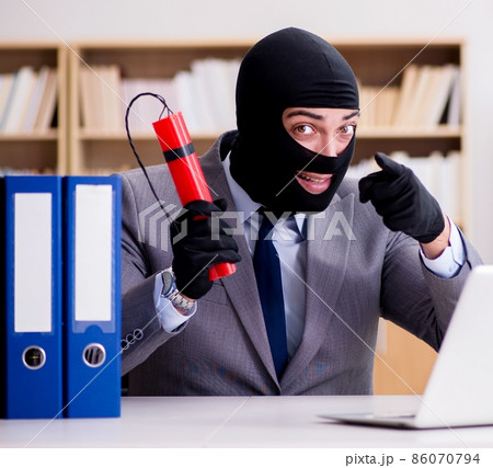 Criminal businessman with balaclava with dynamite 86070794