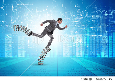 Businessman jumping high on springs 86075135