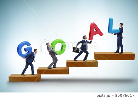 Businessman in goal concept carrying letters 86076017