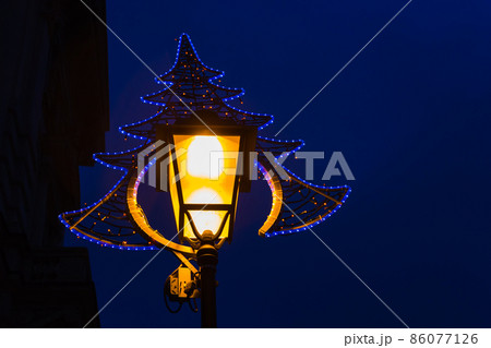 The vintage street lamp, and golden bokeh lights overlay The vintage street lamp, and golden bokeh lights overlay 86077126