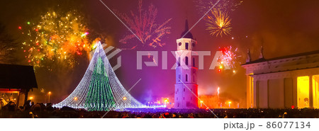 The main firework in Lithuania at New Year. The most interesting and popular viewpoint to historical disrict of Vilnius with Gediminius tower. 86077134
