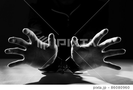 Arrested criminal hands locked in handcuffs. Arrested criminal hands locked in handcuffs. 86080960