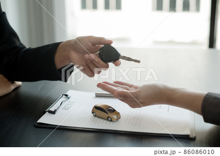 The car dealer provides advice on loans, insurance details, and car rental information, and delivers the car with the keys after the rental contract is signed 86086010