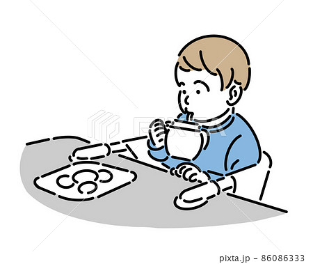 ご飯を食べている椅子に座った1歳児 ご飯を食べている椅子に座った1歳児 86086333