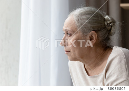 Stressed unhappy old woman thinking of problems at home. 86086805