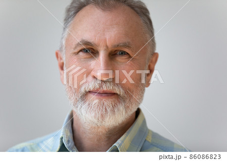 Close up head shot portrait of handsome pleasant mature man. Close up head shot portrait of handsome pleasant mature man. 86086823