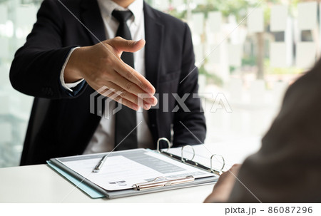 Business people hold a resume and talk to job applicants for job interviews about careers and Their personal history in the company. Recruitment concepts 86087296