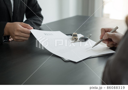 The car dealer provides advice on loans, insurance details, and car rental information, and delivers the car with the keys after the rental contract is signed 86088319