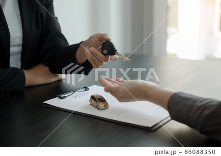 The car dealer provides advice on loans, insurance details, and car rental information, and delivers the car with the keys after the rental contract is signed 86088350