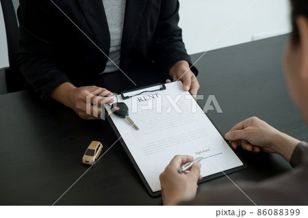 The car dealer provides advice on loans, insurance details, and car rental information, and delivers the car with the keys after the rental contract is signed 86088399