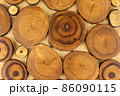 Wooden decorative panel made from round cuts of wood 86090115