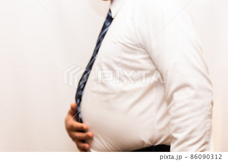 メタボ　肥満　ビジネスマン 86090312