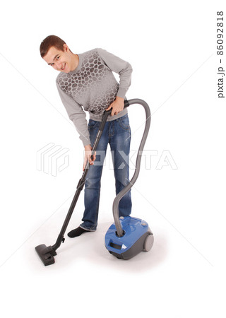 Boy with vacuum cleaner Boy with vacuum cleaner 86092818