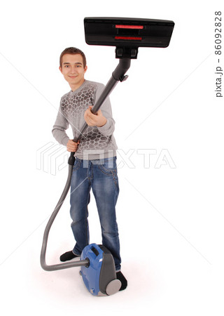Boy with vacuum cleaner 86092828