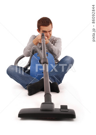 Boy with vacuum cleaner 86092844