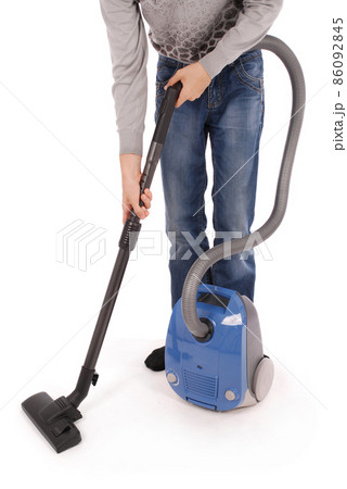 Boy with vacuum cleaner 86092845