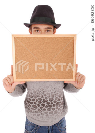 Boy in felt hat holds billboard Boy in felt hat holds billboard 86092850