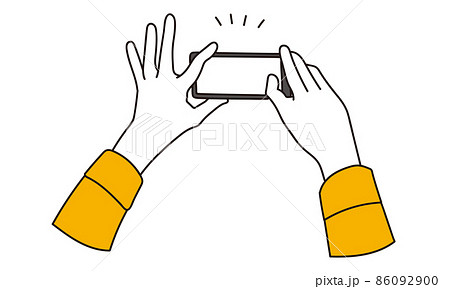 スマートフォンで写真を撮る女性の手元 86092900