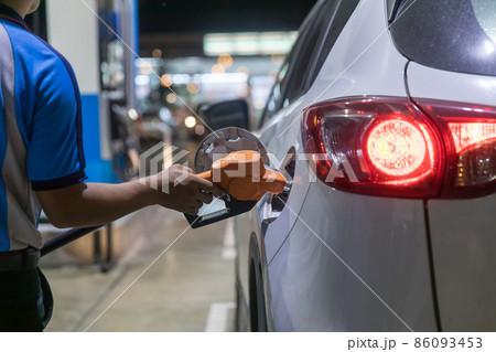 Hand Man Refill and filling Oil Gas Fuel at station. Gas station - refueling Hand Man Refill and filling Oil Gas Fuel at station. Gas station - refueling 86093453
