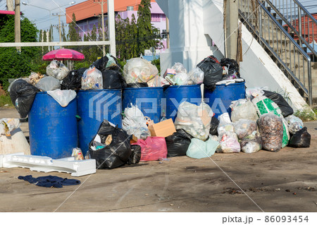 Dumpsters being full with garbage. Dumpsters being full with garbage. 86093454