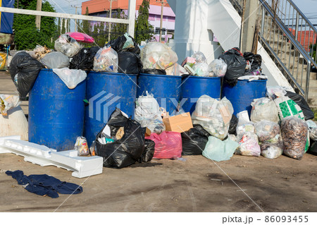 Dumpsters being full with garbage. Dumpsters being full with garbage. 86093455