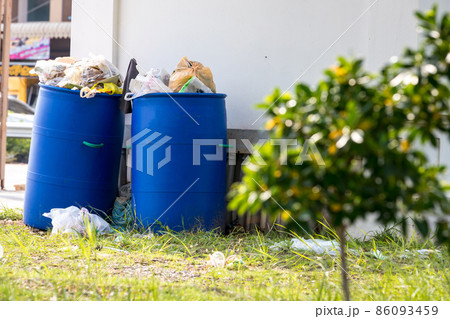 Dumpsters being full with garbage. Dumpsters being full with garbage. 86093459