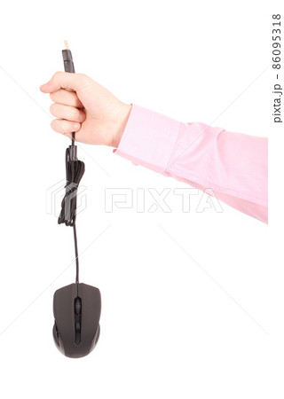 Man holds in his hand black computer optical mouse Man holds in his hand black computer optical mouse 86095318